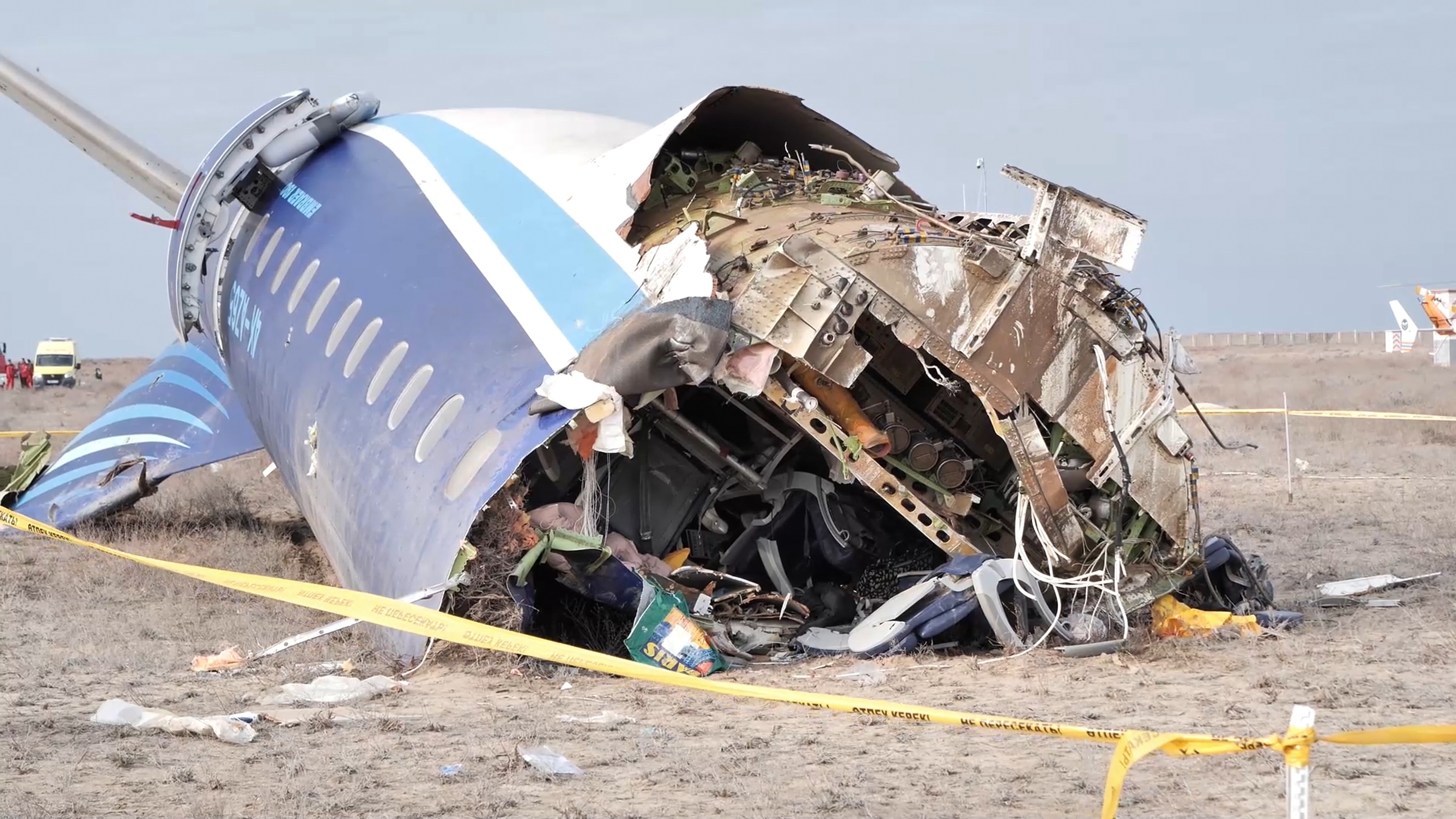 In this photo taken from a video released by the administration of Mangystau region, the wreckage of Azerbaijan Airlines Embraer 190 lies on the ground near the airport of Aktau, Kazakhstan, Wednesday, Dec. 25, 2024. (The Administration of Mangystau Region via AP)