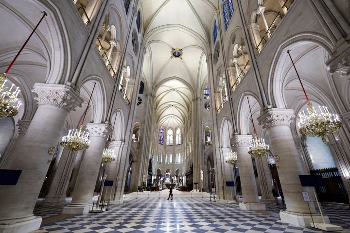 The nave of Notre Dame Cathedral is seen while French President Emmanuel Macron visits the restored interiors of the building.