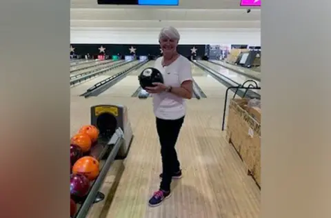 Supplied A photo of Julie at the bowling alley. Julie is holding a bowling ball