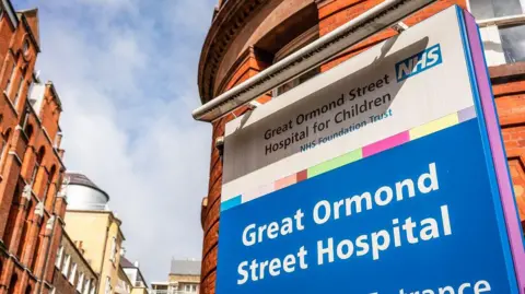 Getty Images A blue sign reads 'Great Ormond Street Hospital'