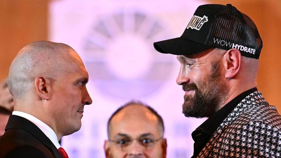 Oleksandr Usyk faces off with Tyson Fury