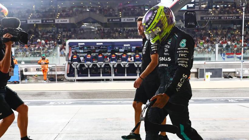 Lewis Hamilton walking back to the Mercedes garage after being eliminated from qualifying for the Abu Dhabi Grand Prix.