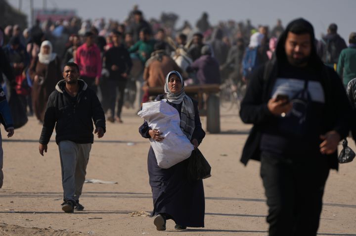 Displaced Palestinians walk on a road in central Gaza to return to their homes in the northern Gaza Strip, on Jan. 29, 2025.