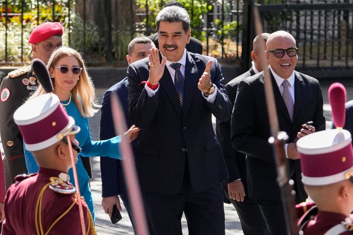 Venezuelan President Nicolas Maduro, center, his wife Cilia Flores, left, and National Assembly President Jorge Rodriguez arrive at the National Assembly for Maduro's swearing-in ceremony for a third term in Caracas, Venezuela, on Jan. 10, 2025.