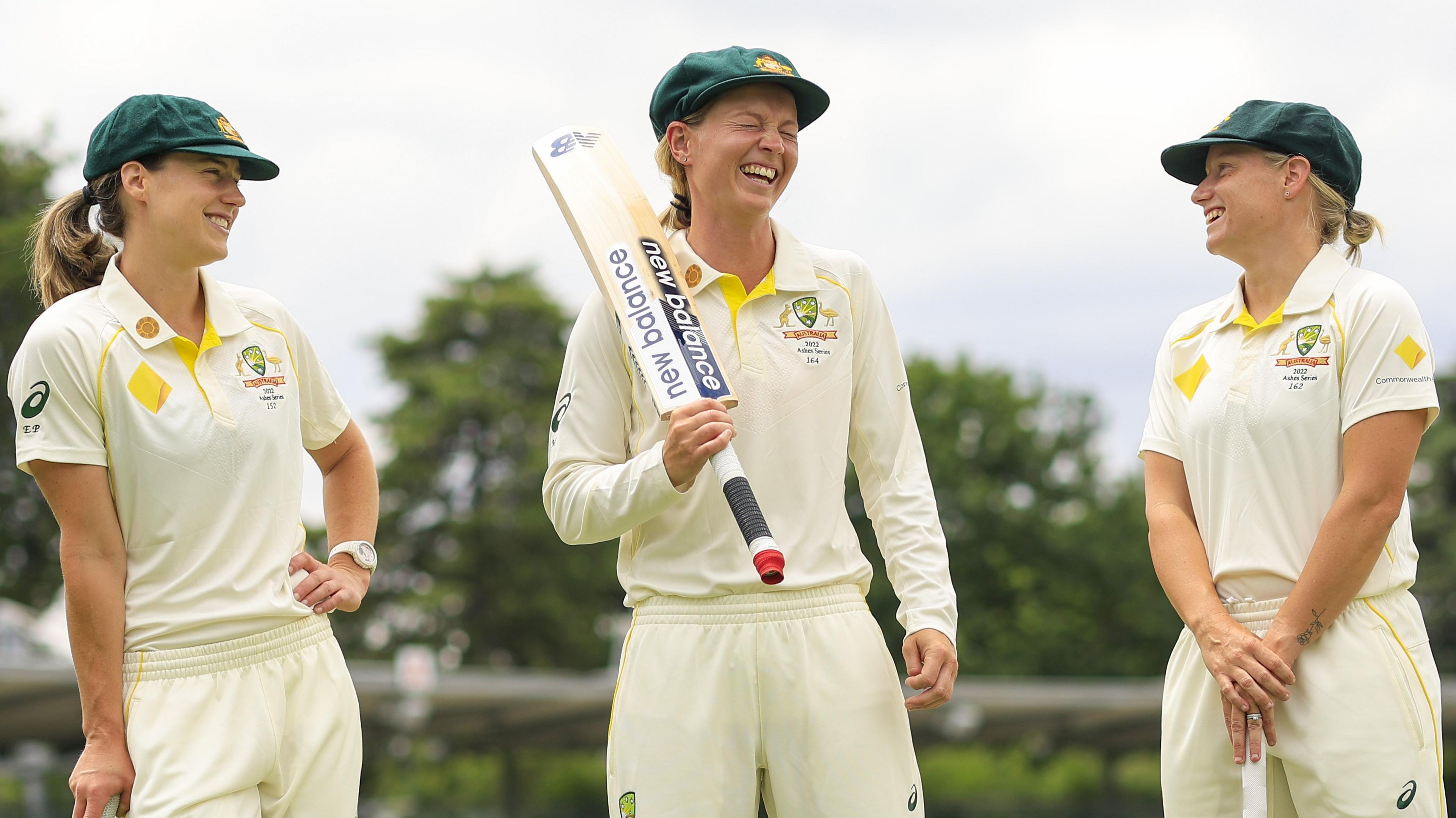 Ellyse Perry, left, Meg Lanning, centre, and Alyssa Healy joke