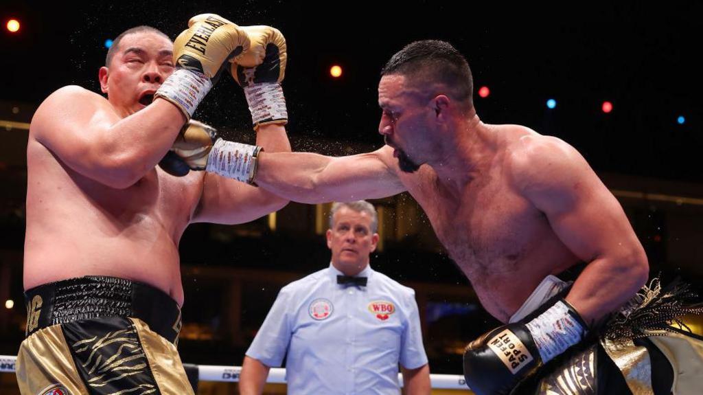 Joseph Parker connects with a straight right against Zhilei Zhang in Saudi Arabia