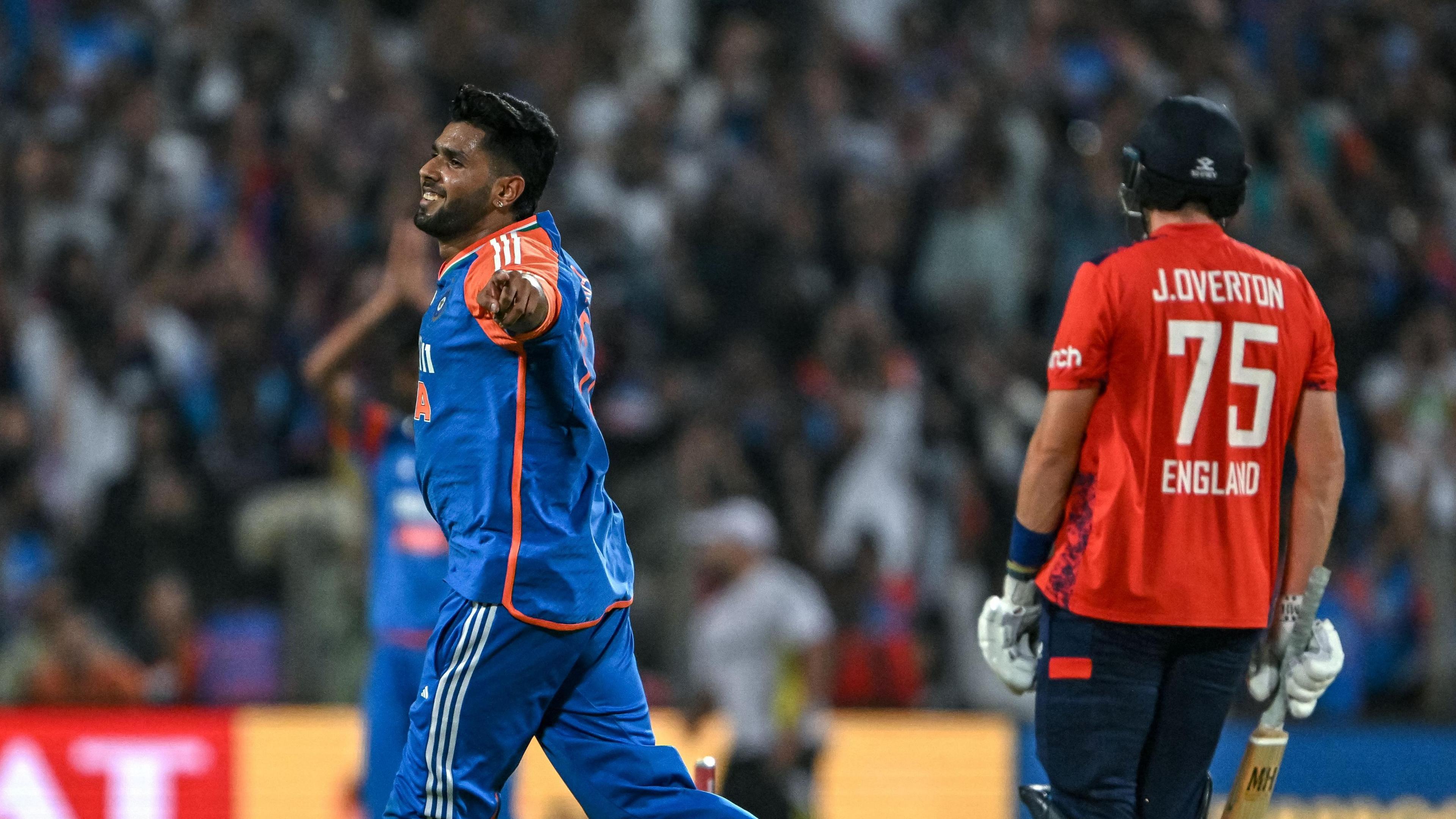 India's Harshit Rana celebrates the wicket of England's Jamie Overton in the fourth T20 in Pune