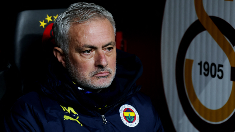 Fenerbahce manager Jose Mourinho sat in the dugout for his team's game at Galatasaray in February 2025