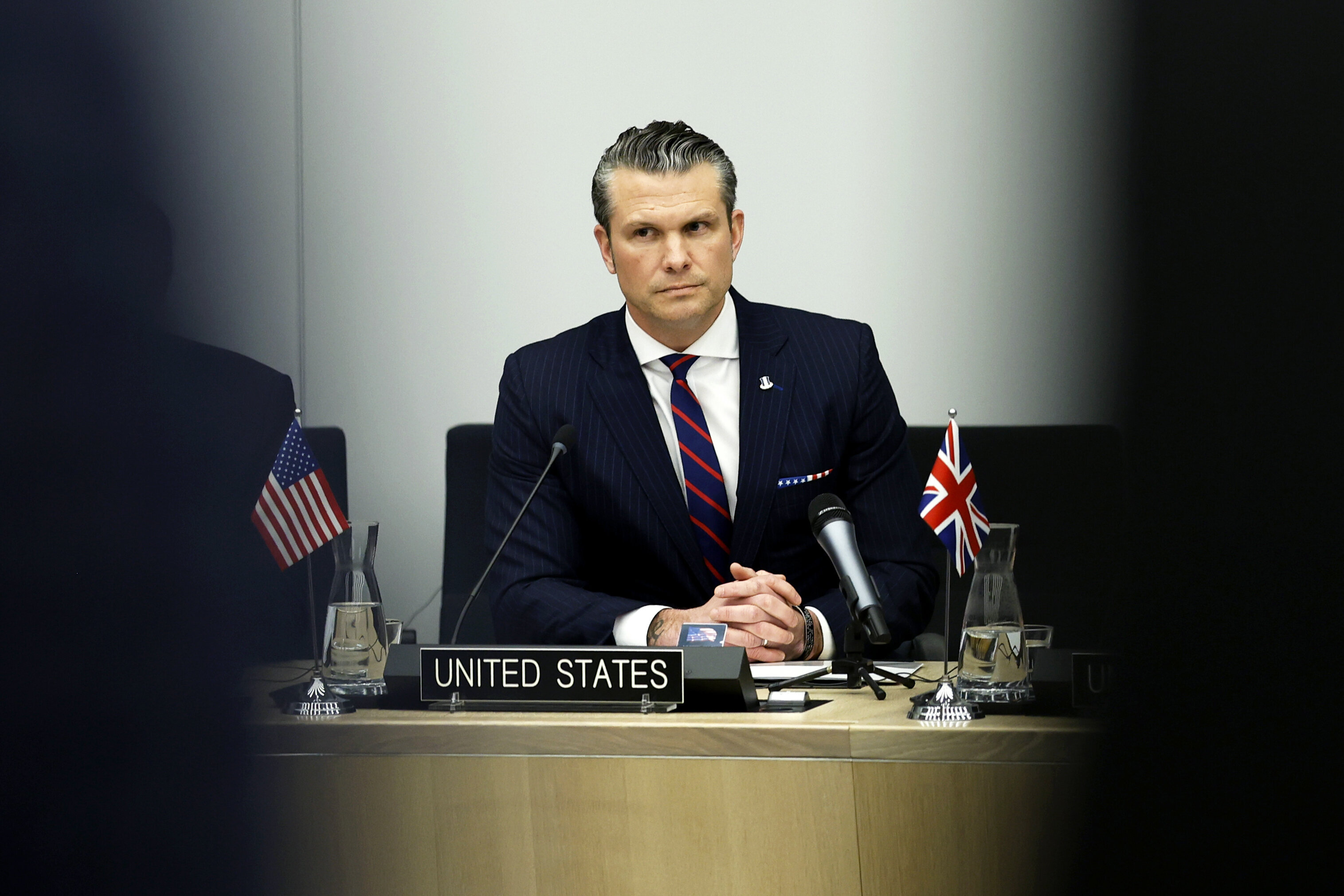 United States Secretary of Defense Pete Hegseth listens to opening statements during a meeting of the Ukraine Defense Contact group at NATO headquarters in Brussels, Wednesday, Feb. 12, 2025. (AP Photo/Omar Havana)