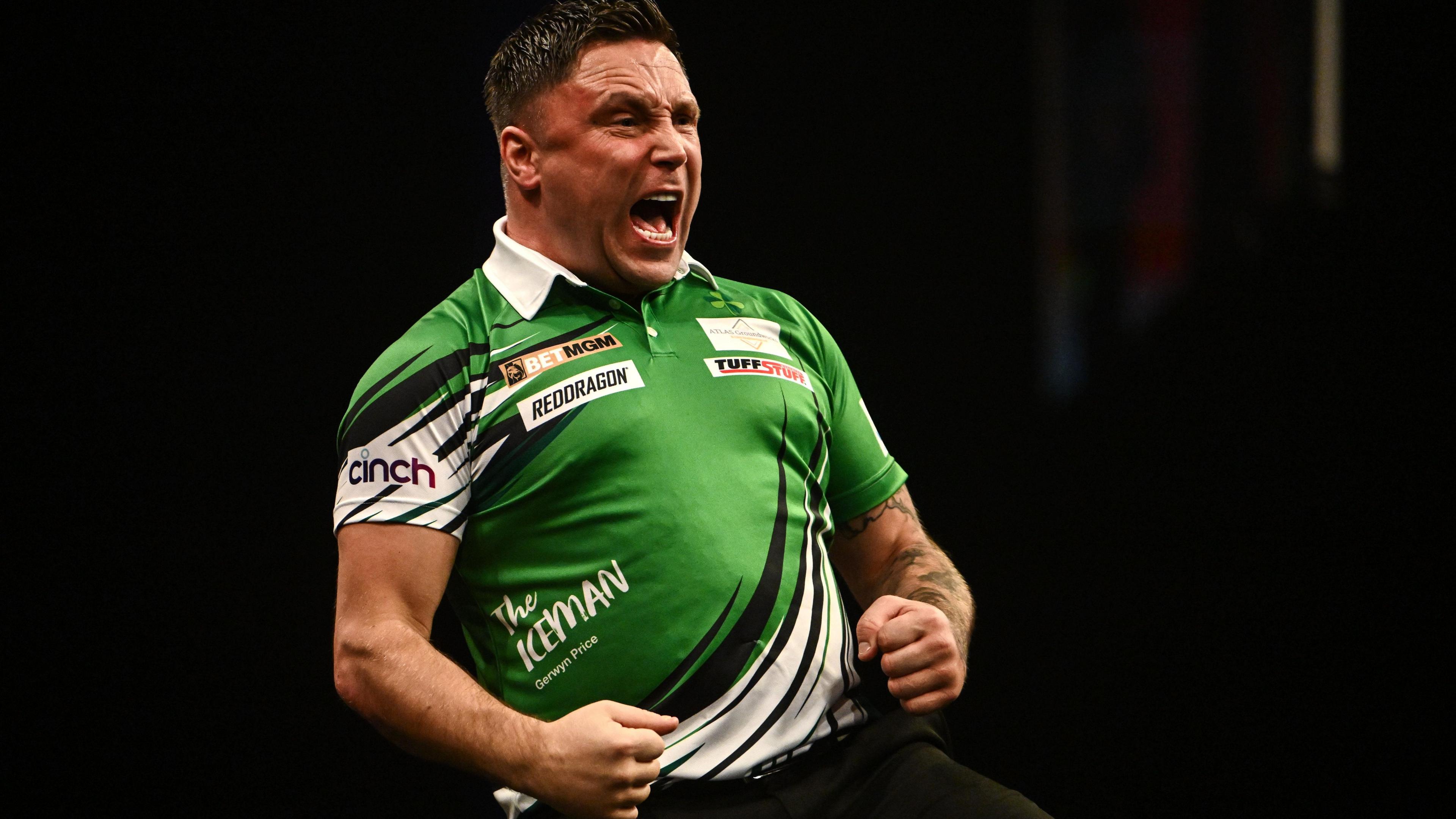 Gerwyn Price celebrates winning a leg against Luke Littler