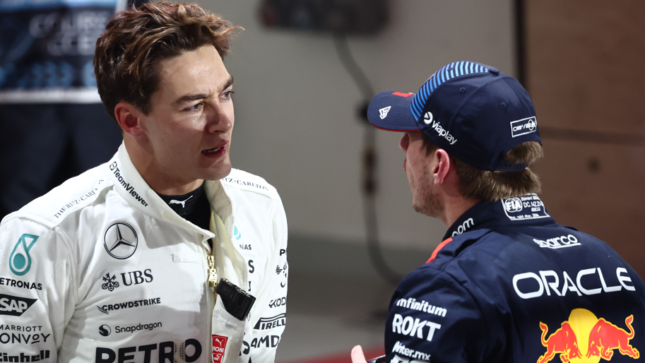 George Russell of Mercedes and Max Verstappen of Red Bull Racing in conversation in November 2024