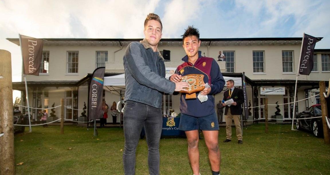 Marcus Smith is is awarded the player of the tournament trophy at St Joseph's Festival in 2016