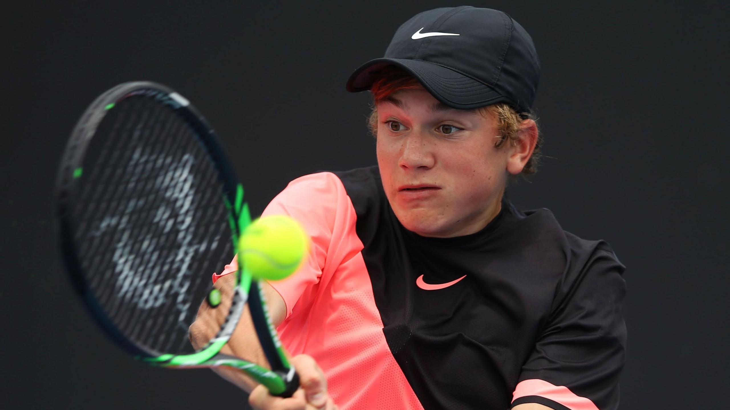 Jack Draper hits a forehand return in the boys singles at the 2018 Australian Open