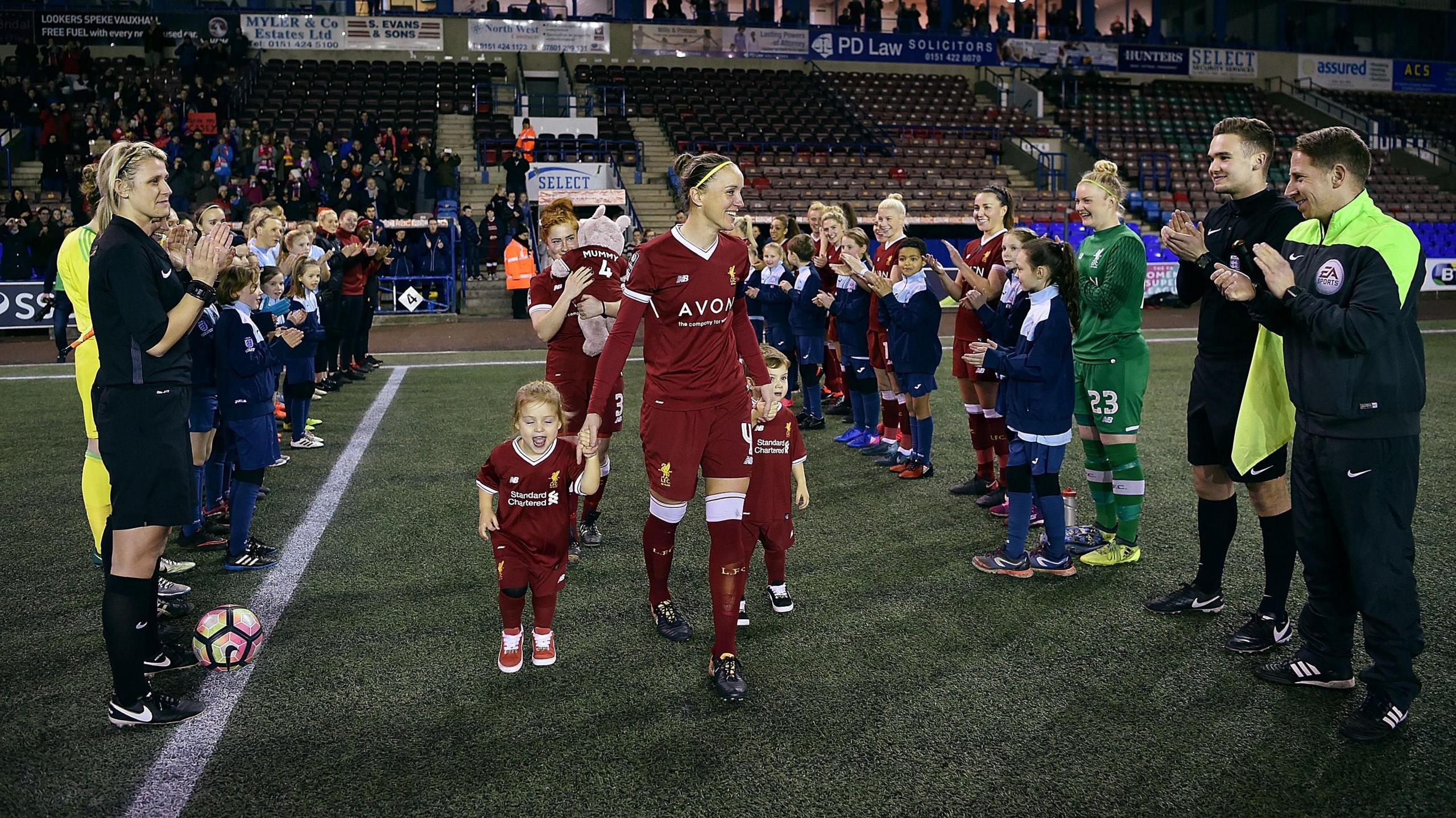 Casey Stoney walks out to a guard of honour with her three children ahead of her final match as a player in February 2018