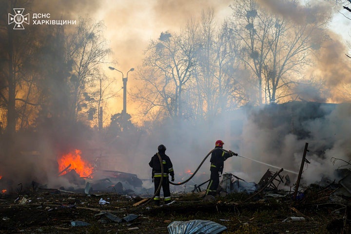 In this photo provided by the Ukrainian Emergency Service, firefighters put out the fire following a Russian rocket attack in Kharkiv, Ukraine, on March 7, 2025.