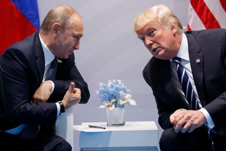 FILE - President Donald Trump meets with Russian President Vladimir Putin at the G-20 Summit in Hamburg, July 7, 2017. (AP Photo/Evan Vucci, File)