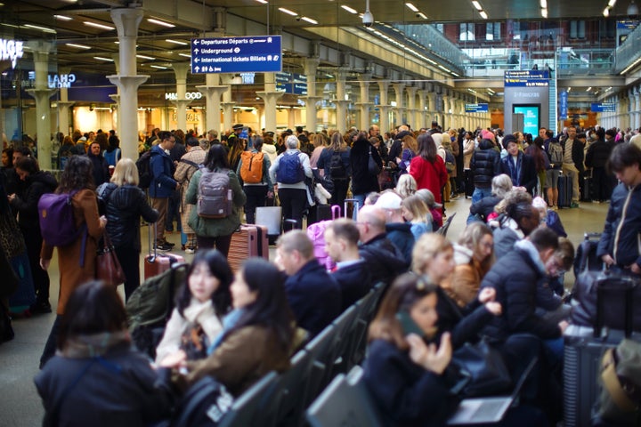 Passengers at St Pancras International station in London, after Eurostar trains to the capital have been halted following the discovery of an unexploded Second World War bomb near the tracks in Paris.